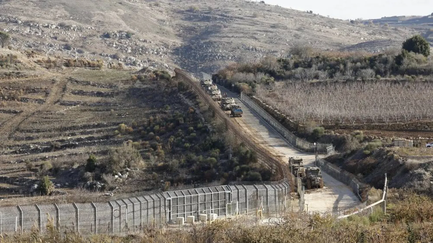 Israeli tanks take position on the border with Syria near the Druze village of Majdal Shams in the Israel-annexed Golan Heights on December 8, 2024. (AFP via Getty Images) 