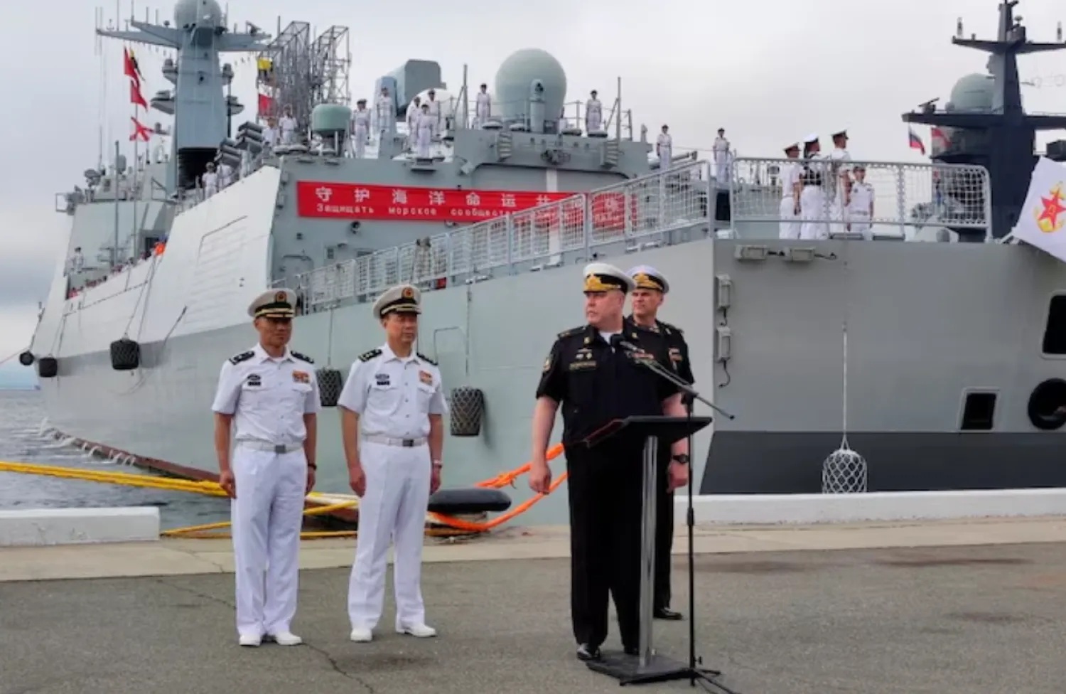 Russian and Chinese naval officers take part in a ceremony marking the start of the upcoming joint naval drills in the Sea of Japan, following the arrival of Chinese military vessels in Vladivostok, Russia, July 31, 2025. Russian Defence Ministry/Russia's Pacific Fleet/Handout via REUTERS/File Photo