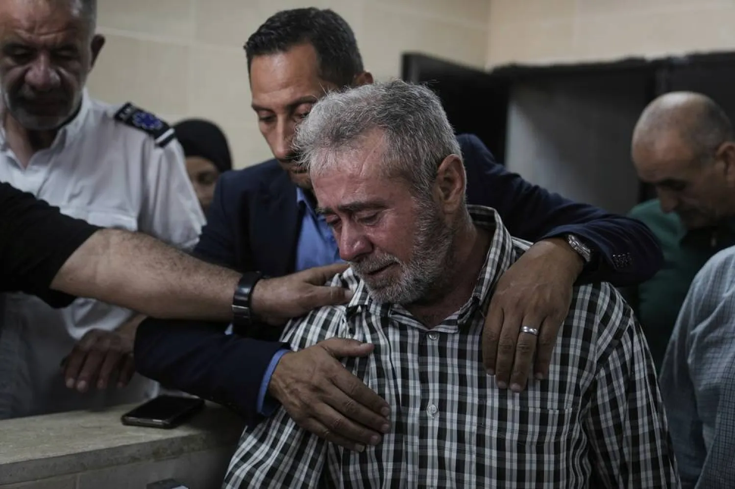 Mourners gather at a hospital in Nablus, West Bank, Sunday, Aug. 3, 2025, for the funeral of Muin Asfar, 24, a Palestinian killed during clashes with Israeli settlers in the village of Aqraba. (AP) 