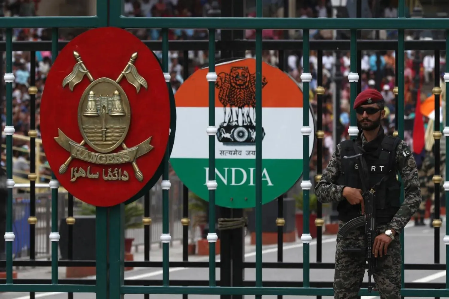 A Pakistani Ranger stands guard during the 'Beating Retreat' ceremony at the border gates of Pakistan and India at the Wagah border post near Lahore on May 4, 2025. (EPA) 