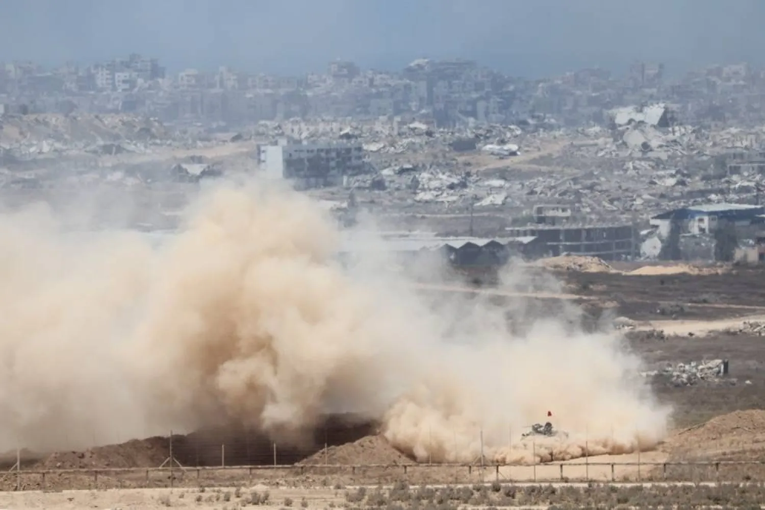 Israeli army vehicles maneuver inside the Gaza Strip, as seen from the Israeli side of the border with Gaza, in southern Israel, 03 August 2025. (EPA)