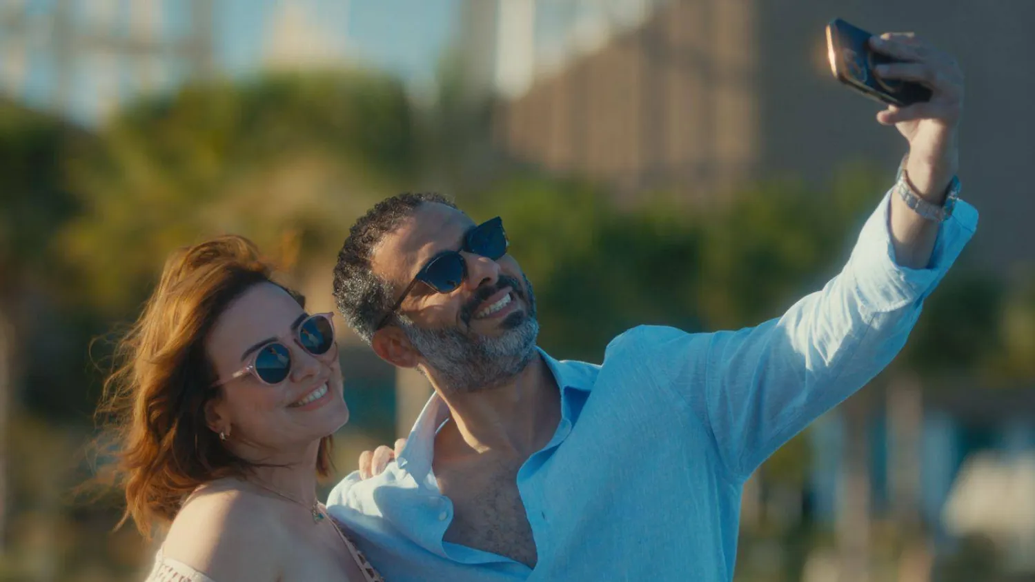 محمد فراج وريهام عبد الغفور في مسلسل «كتالوج» (نتفليكس)