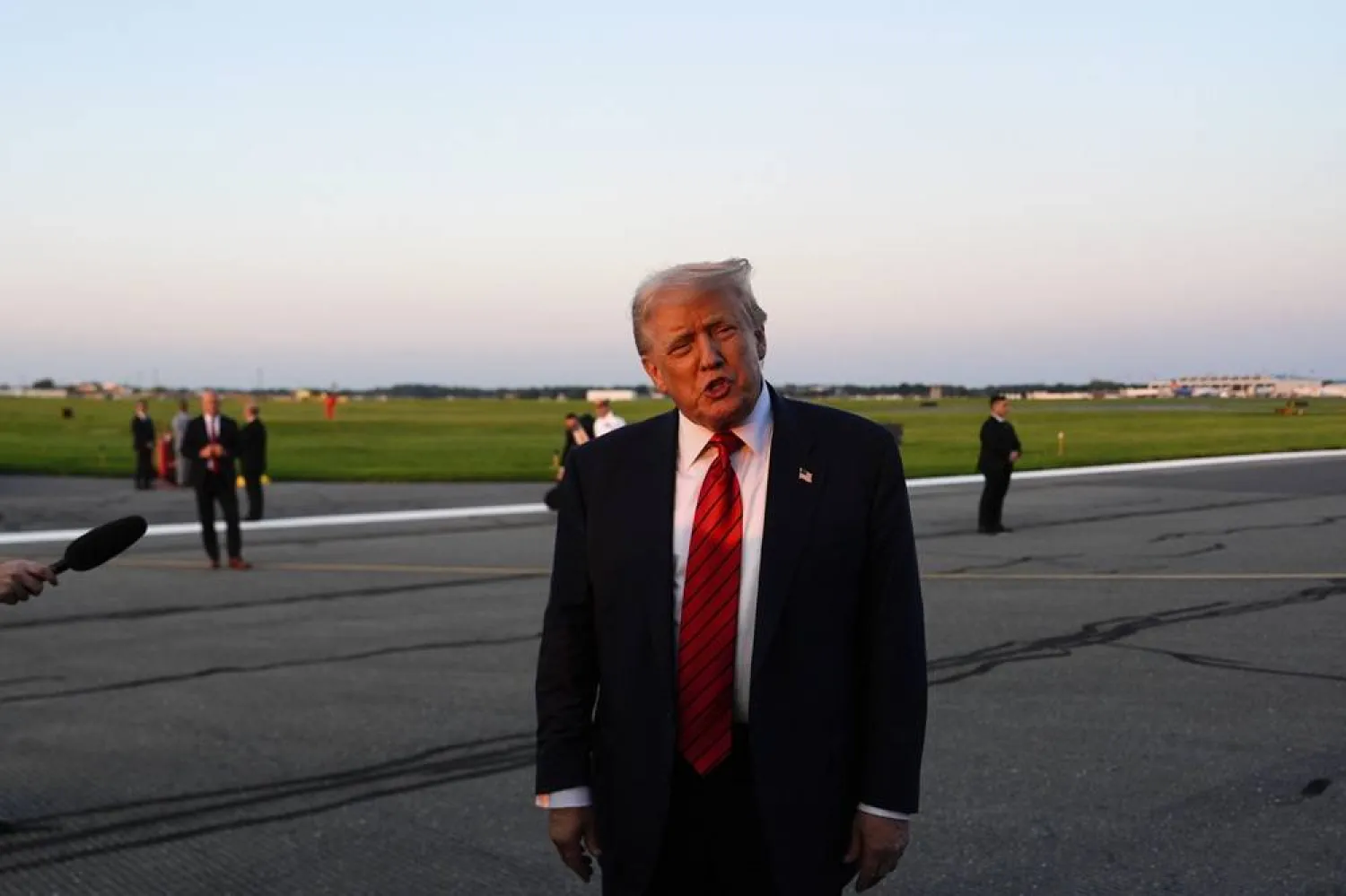  President Donald Trump speaks with reporters before boarding Air Force One at Lehigh Valley International Airport, Sunday, Aug. 3, 2025, in Allentown, Pa. (AP) 