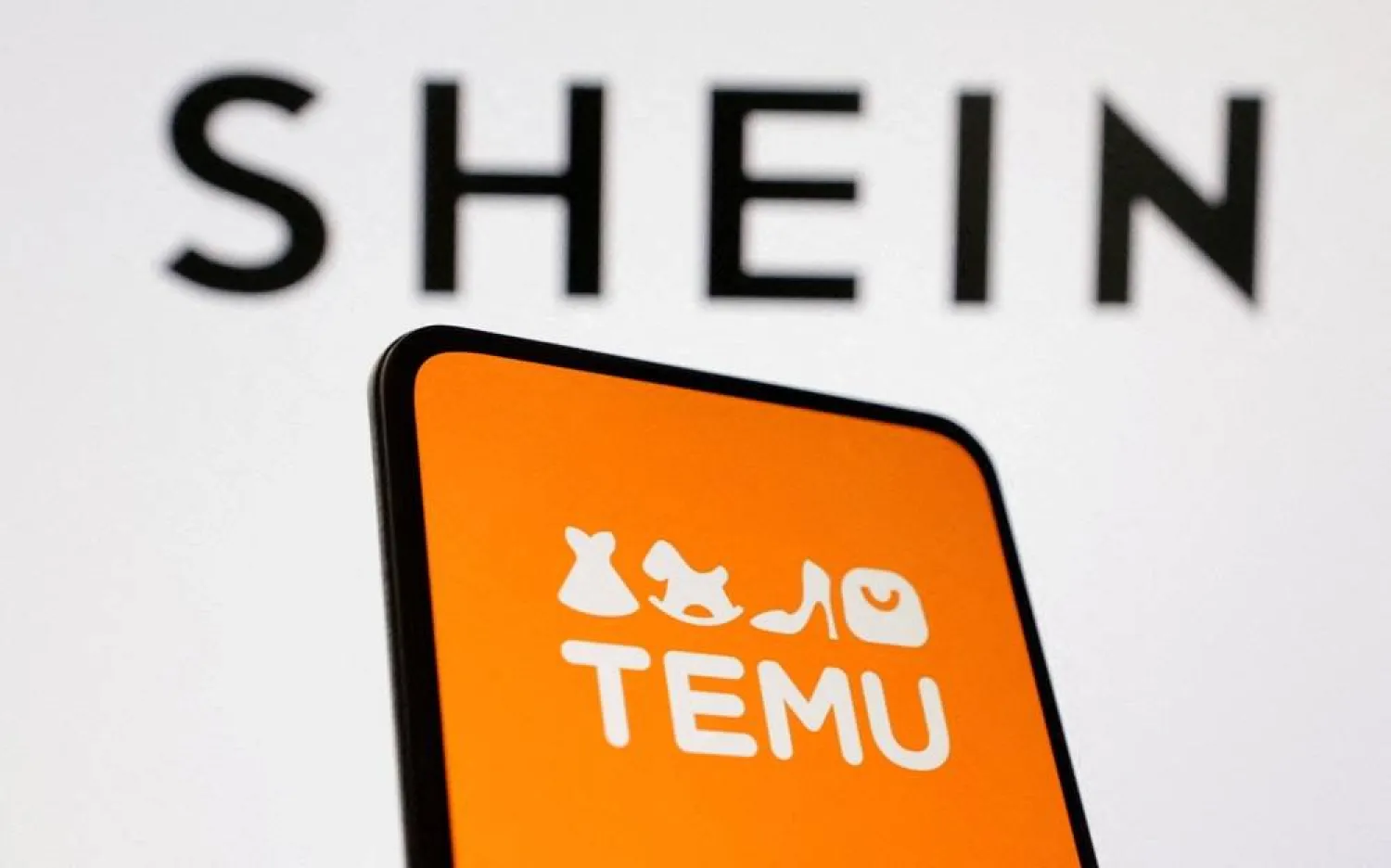 Shein and Temu logos are seen in this illustration taken August 22, 2024. (Reuters) 