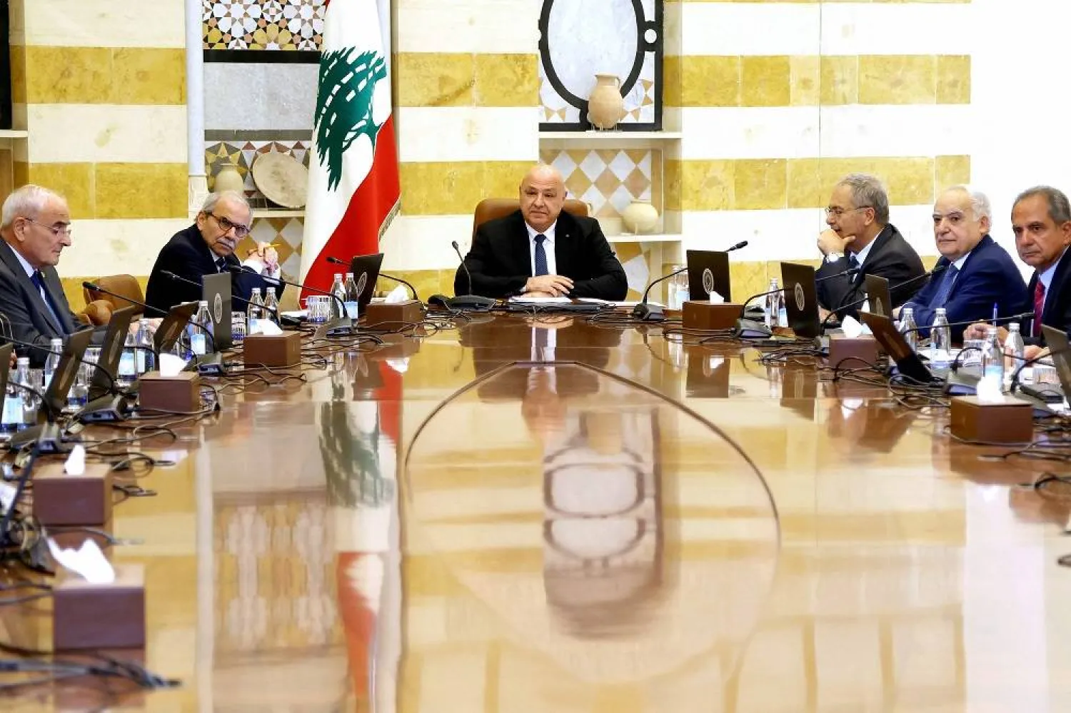 This handout photo released by the Lebanese Presidency press office on August 5, 2025, shows Lebanon's President Joseph Aoun (C) chairing a meeting of a cabinet session to discuss the issue of disarming Hezbollah at the presidential palace of Baabda east of Beirut.  (Lebanese Presidency) 