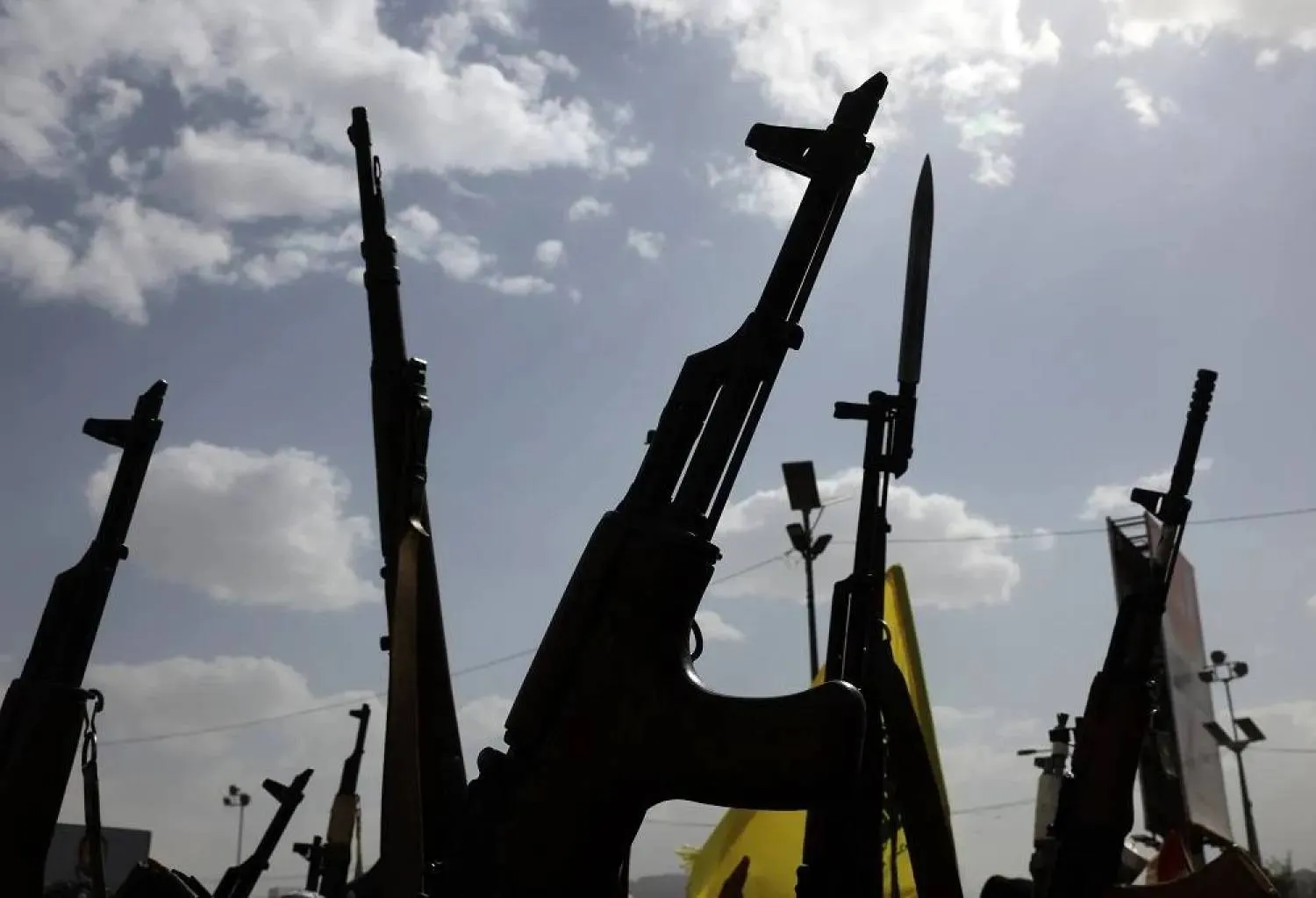 Houthi supporters hold up weapons during a protest against the US and Israel, in Sanaa, Yemen, 18 July 2025. (EPA)