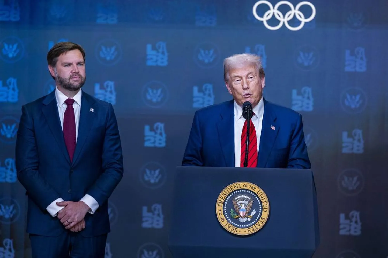 US President Donald Trump, with US Vice President JD Vance, deliver remarks prior to signing an executive order to establish an Olympic task force at the White House in Washington, DC, USA 05 August 2025. (EPA)