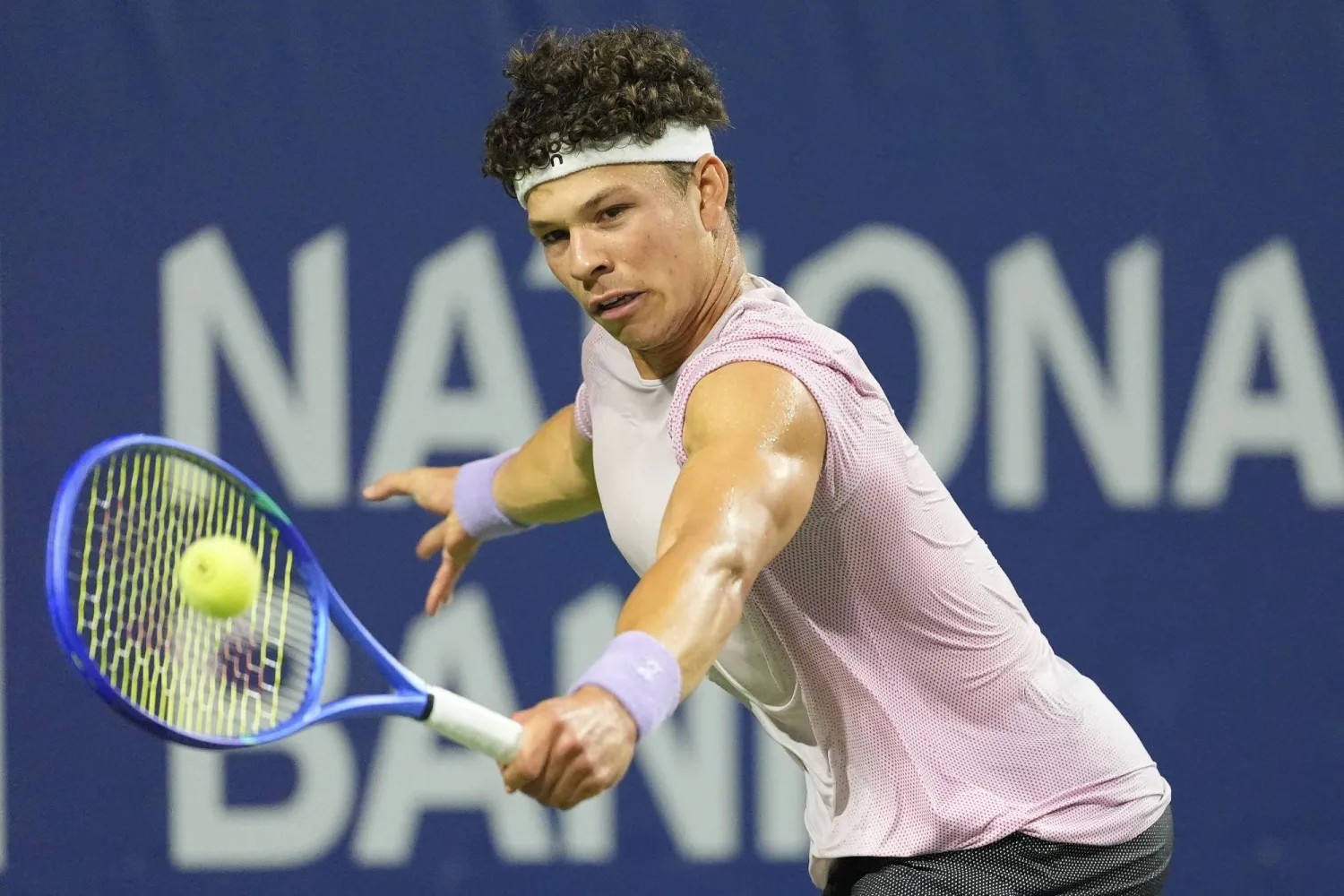 Aug 6, 2025; Toronto, ON, Canada; Ben Shelton (USA) hits a ball to Taylor Fritz (not pictured) during semifinals at Sobeys Stadium. Mandatory Credit: John E. Sokolowski-Imagn Images