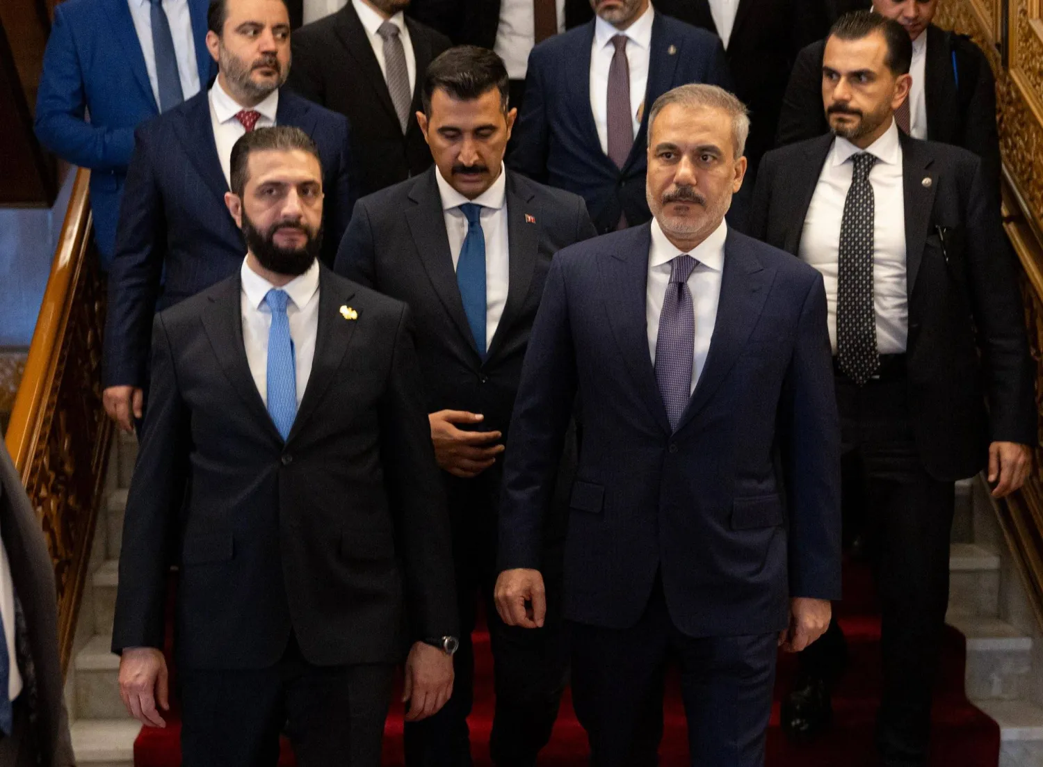 الرئيس السوري أحمد الشرع خلال استقبال وزير الخارجية التركي هاكان فيدان في دمشق - 7 أغسطس 2025 (فيدان عبر منصة إكس)