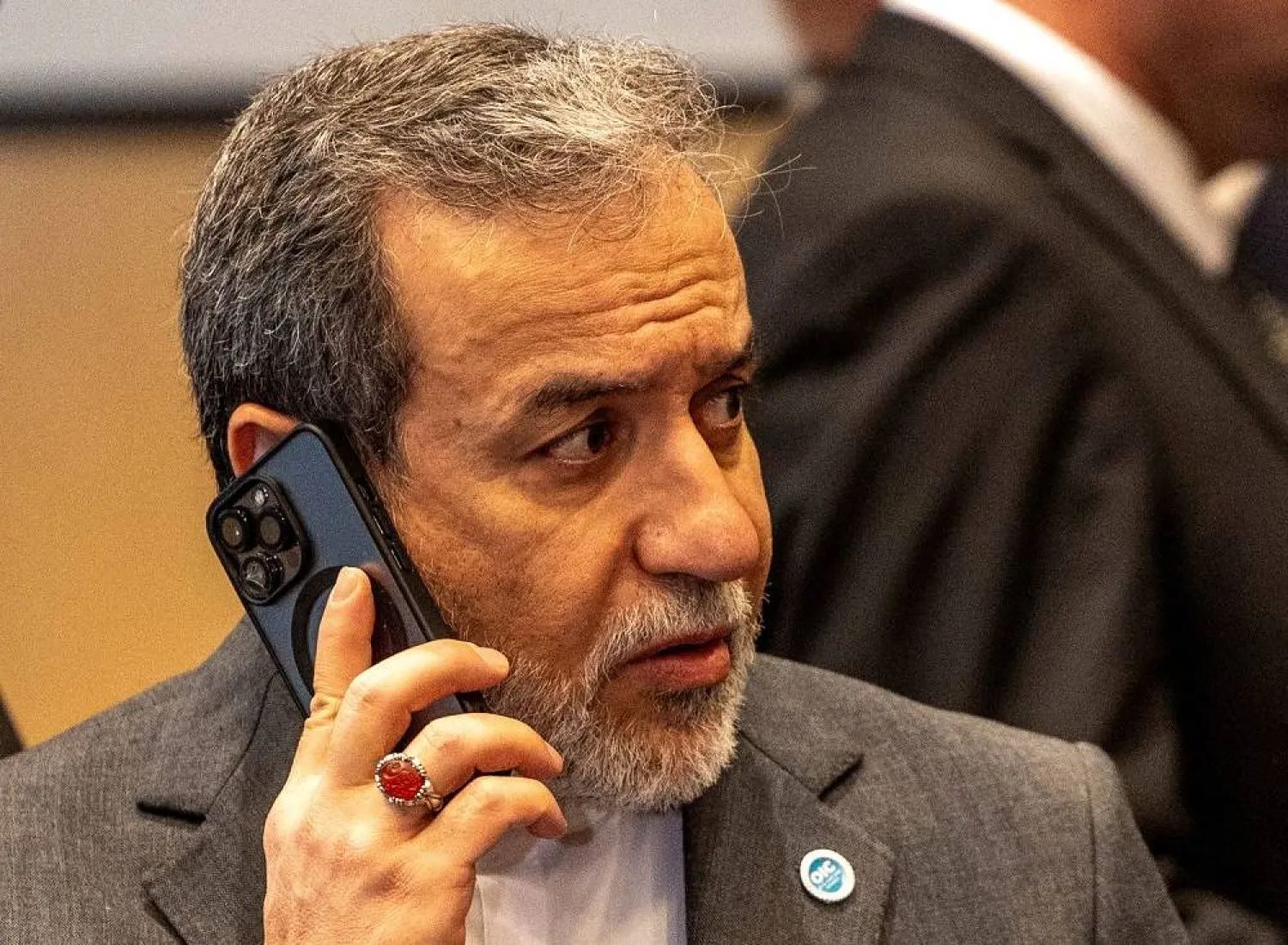 Iranian Foreign Minister Abbas Araghchi makes a phone call during the 51st Session of the Council of Foreign Ministers of the Organization of Islamic Cooperation (OIC) in Istanbul, Türkiye, June 21, 2025. (Reuters) 