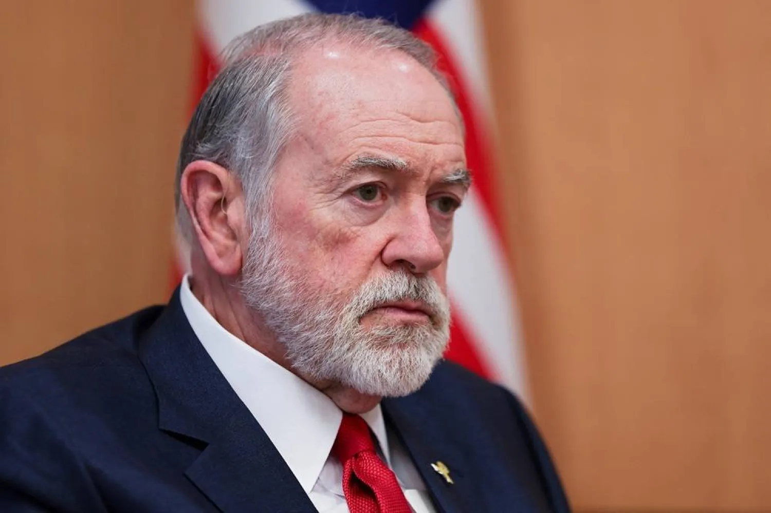 US Ambassador to Israel Mike Huckabee looks on during an interview with Reuters at his office in the US Embassy in Jerusalem, August 8, 2025. (Reuters)