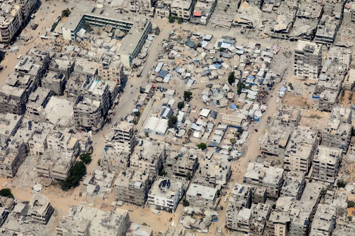  An aerial view from a Jordanian military aircraft shows the Gaza Strip, before humanitarian aid is airdropped over it, in Gaza, August 9, 2025. (Reuters)