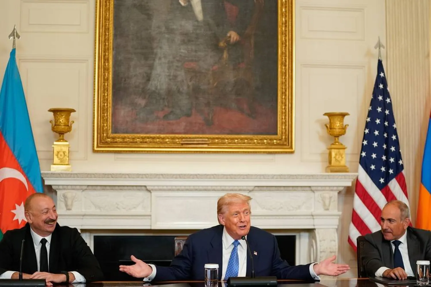 (L-R) Azerbaijan's President Ilham Aliyev, US President Donald Trump, and Armenia's Prime Minister Nikol Pashinyan attend a signing ceremony in the State Dining Room of the White House in Washington, DC, USA, 08 August 2025. (EPA) 
