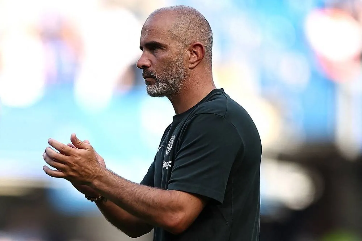 Chelsea's Italian head coach Enzo Maresca applauds the fans following the pre-season friendly football match between Chelsea and AC Milan at Stamford Bridge in London on August 10, 2025. (AFP)