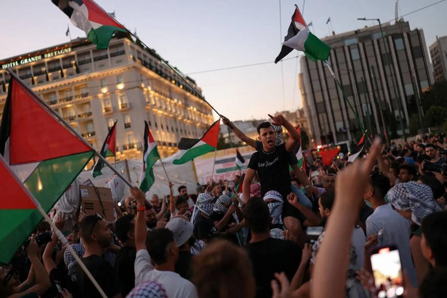 Pro-Palestinian protesters shout slogans at Syntagma Square during a protest, part of demonstrations taking place across Greece, in Athens, August 10, 2025. (Reuters)