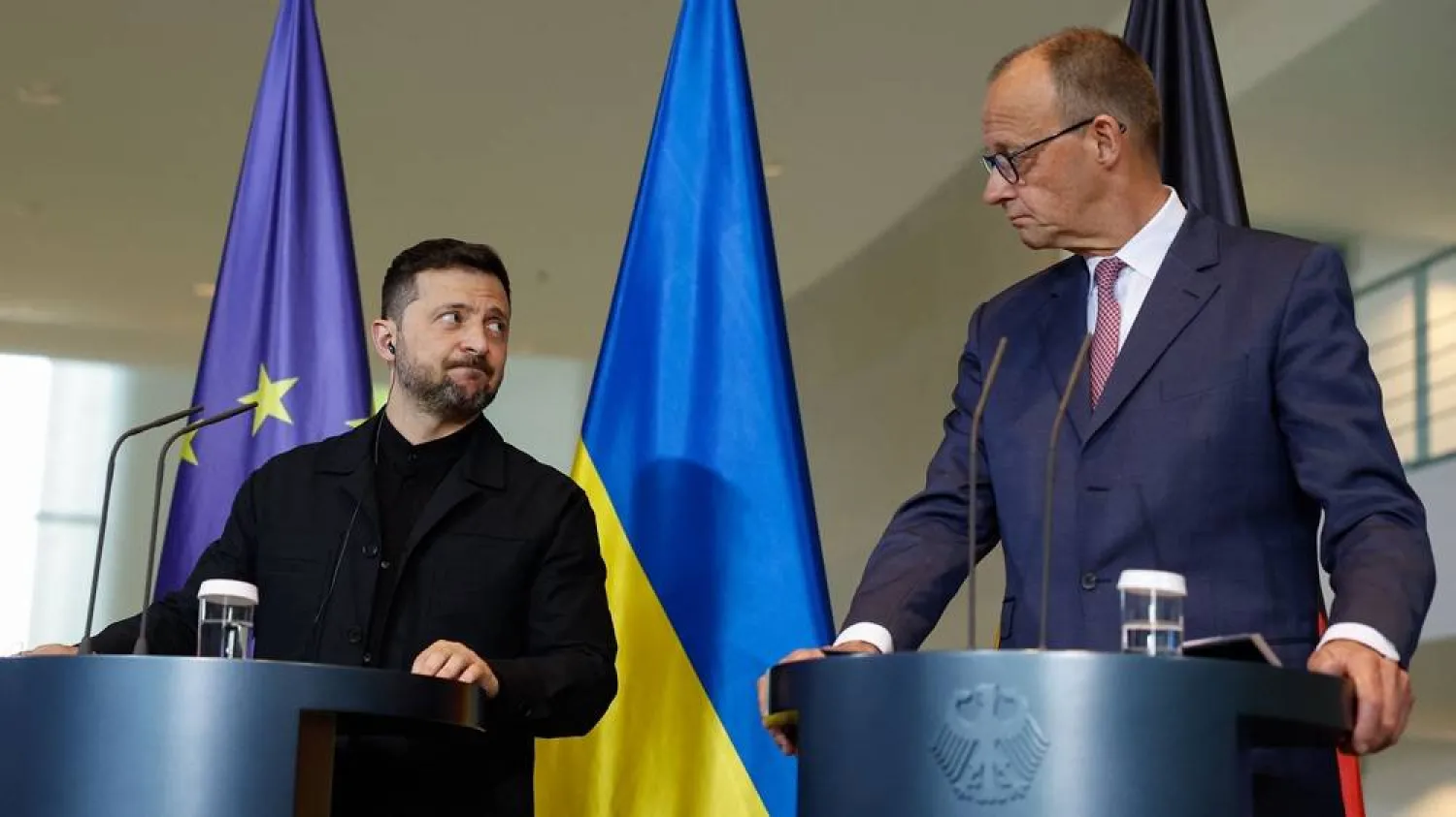 German Chancellor Friedrich Merz (R) and Ukrainian President Volodymyr Zelenskyy give a joint press conference at the Chancellery in Berlin on May 28, 2025. (AFP) 