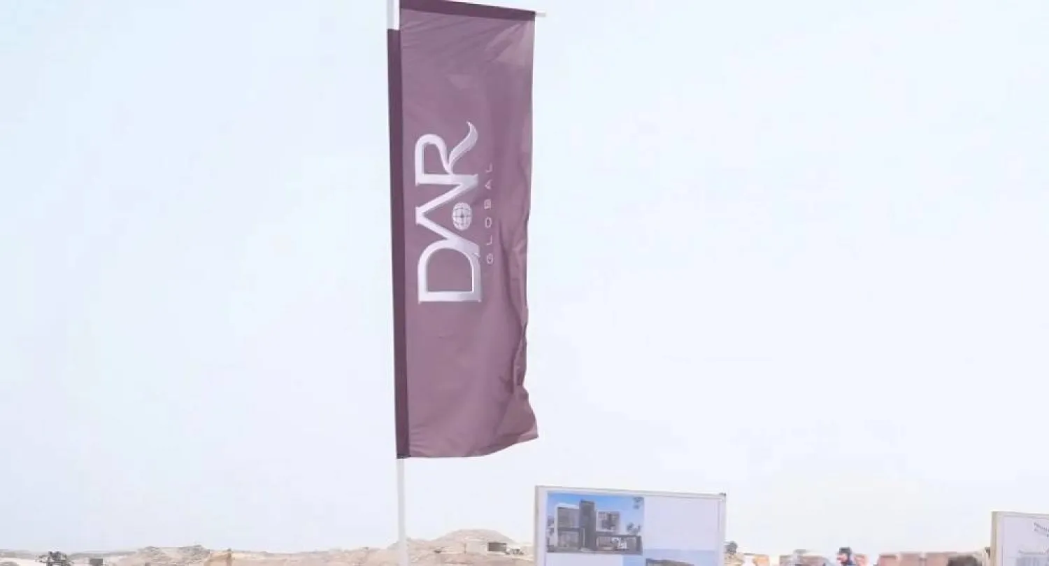 The Dar Global logo is seen at one of its projects. (Asharq Al-Awsat) 