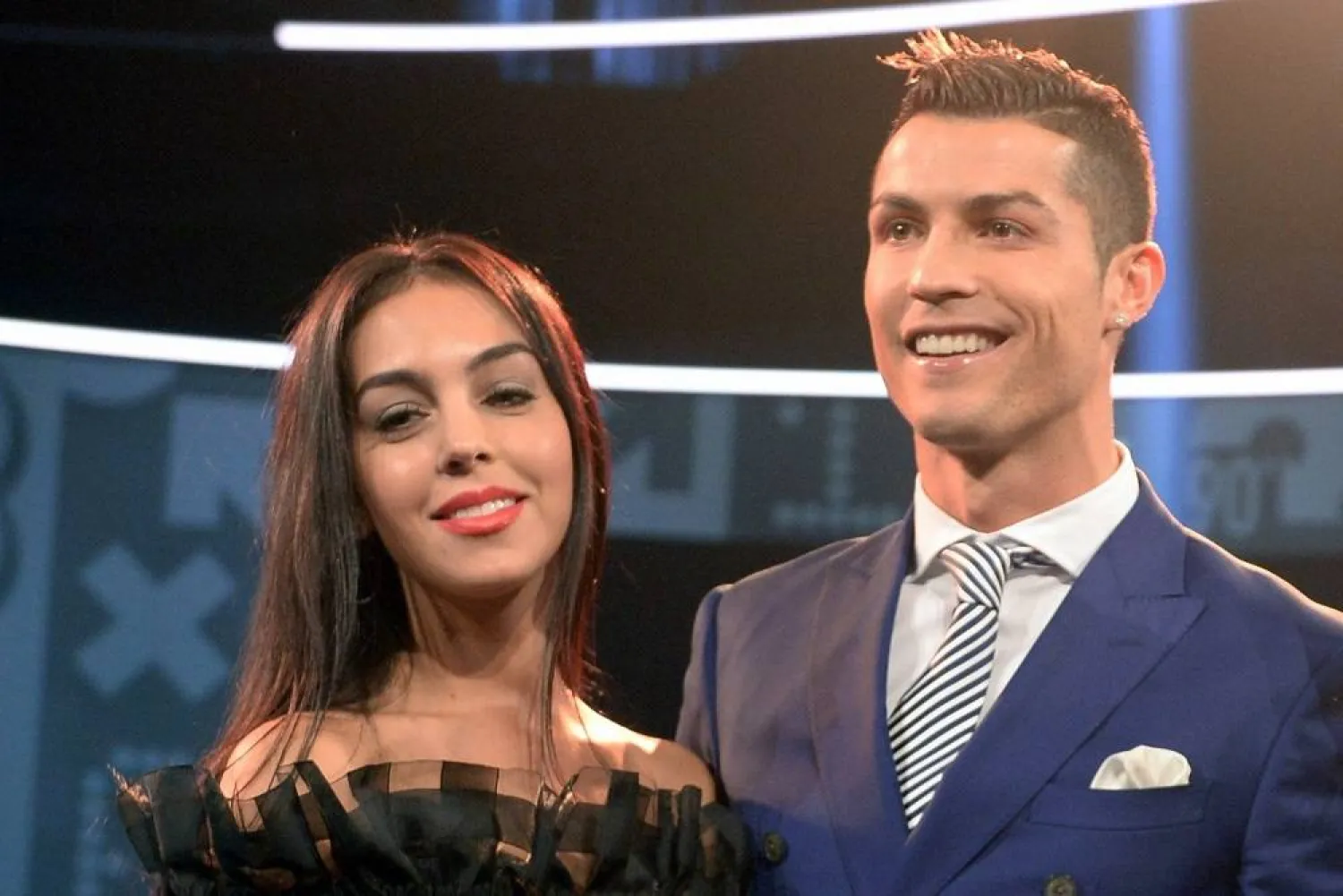 09 January 2017, Switzerland, Zurich: Portuguese footballer Cristiano Ronaldo accepts the FIFA World Player of the Year 2016 award alongside Georgina Rodriguez in Zurich. (dpa)