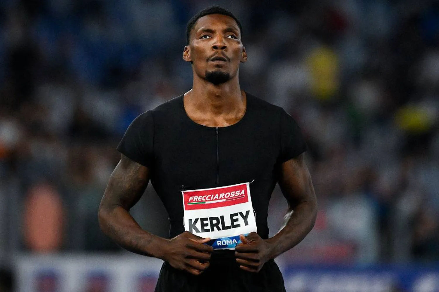 العداء الأميركي فريد كيرلي (وسائل إعلام أميركية)