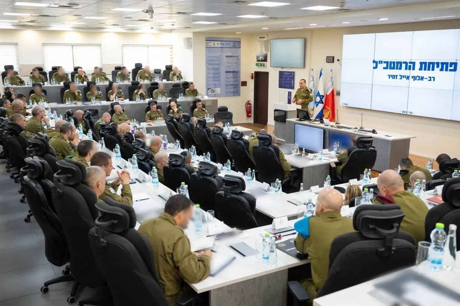 A photo released by the Israeli army shows Zamir during a field assessment with military commanders at the Glilot base on July 21.   