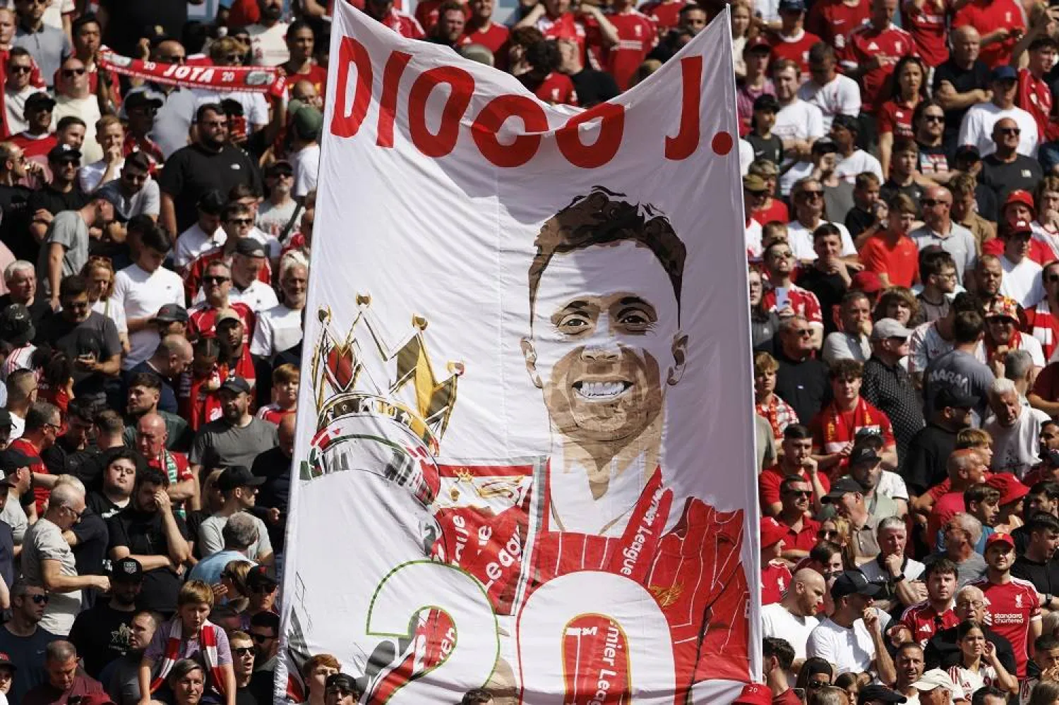 Liverpool fans display a banner in the memory of the late Diogo Jota during the FA Community Shield match between Crystal Palace and Liverpool at the Wembley Stadium in London, Great Britain, 10 August 2025. (EPA)