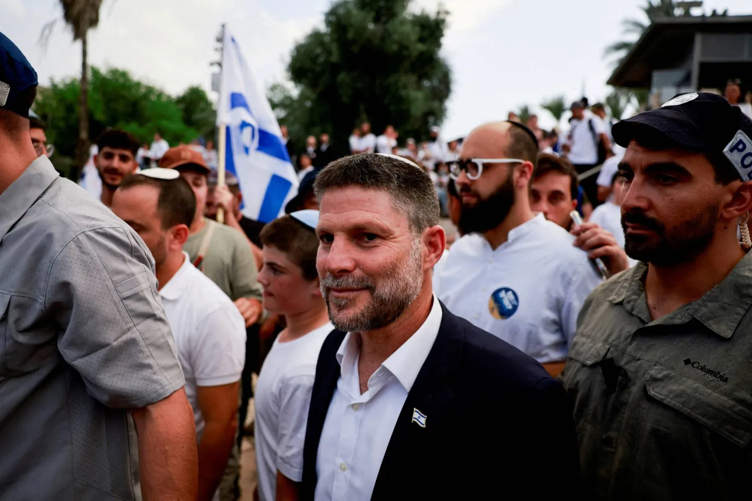 FILE PHOTO: Israeli Finance Minister Bezalel Smotrich walks to visit the Damascus Gate to Jerusalem's Old City, as Israelis mark Jerusalem Day, in Jerusalem May 26, 2025. REUTERS/Ammar Awad/File Photo