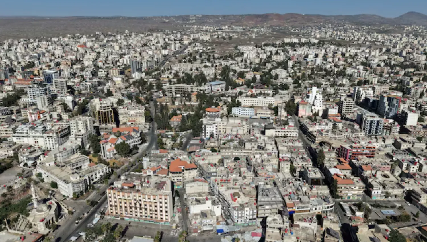 A drone view shows the predominantly Druze city of Sweida, in Syria July 25, 2025. REUTERS/Khalil Ashawi/File Photo