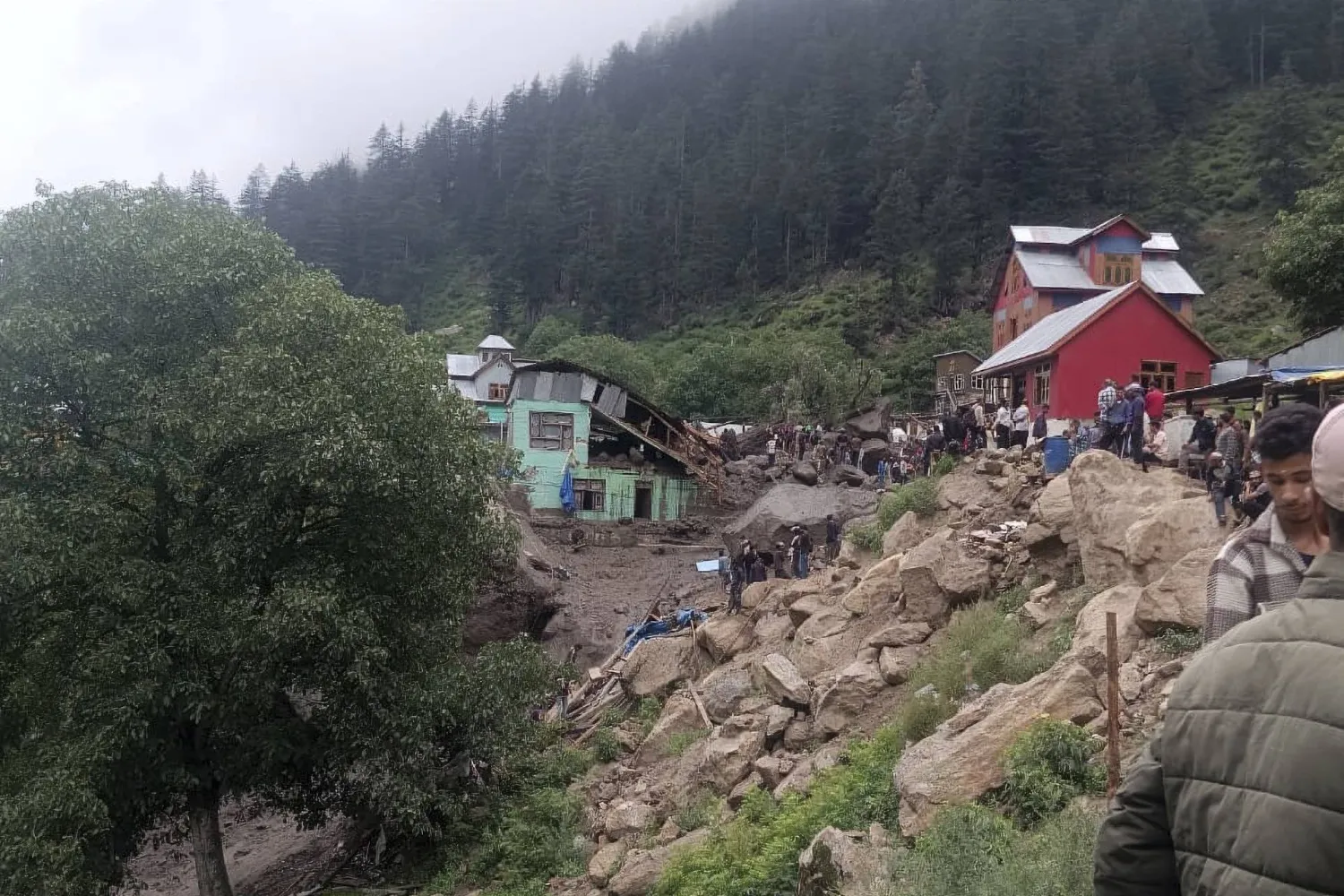 Buildings damaged in flash floods caused by torrential rains are seen in a remote, mountainous village, in Chositi area, Indian controlled Kashmir, Thursday, Aug. 14, 2025. (AP Photo)