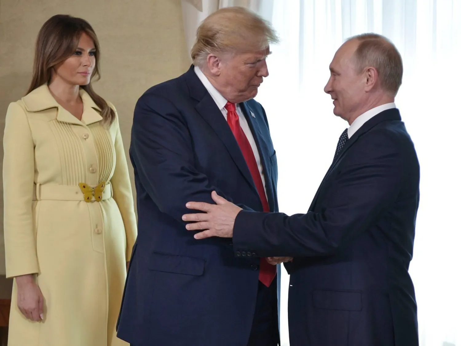 جانب من لقاء بوتين بترمب وزوجته ميلانيا في هلسنكي يوم 16 يوليو 2018 (أرشيفية - أ.ب)