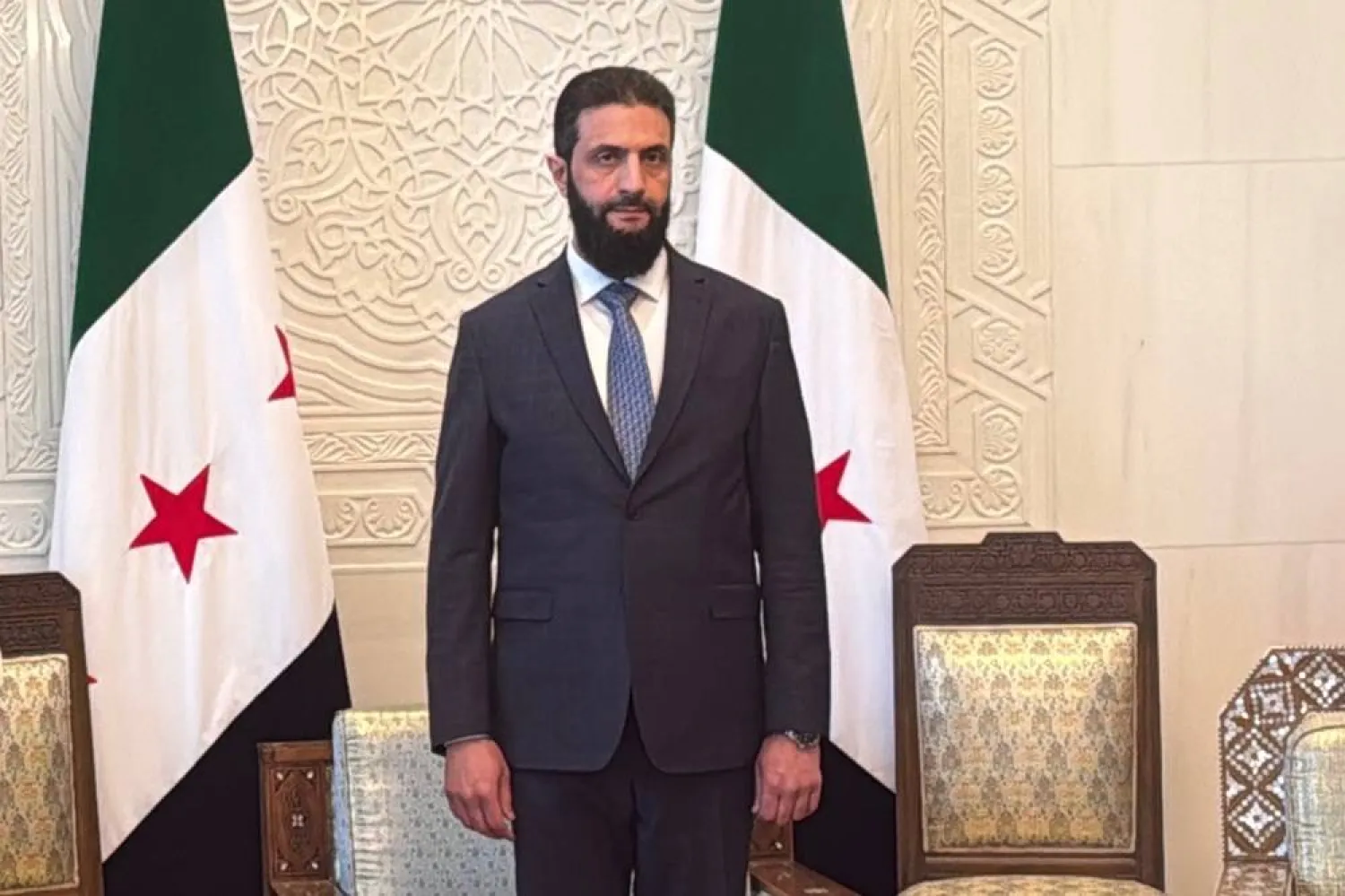 03 January 2025, Syria, Damascus: Syrian interim President Ahmed al-Sharaa stands during a meeting at the presidential palace in Damascus. (dpa) 