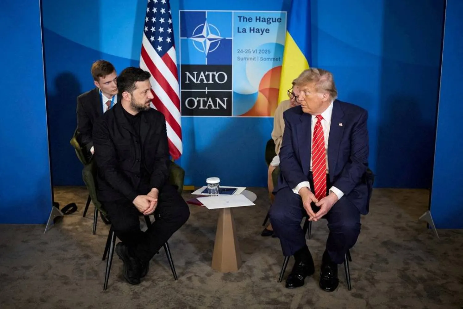US President Donald Trump and Ukraine's President Volodymyr Zelenskiy attend a meeting on the sidelines of NATO summit in The Hague, Netherlands June 25, 2025. (Ukrainian Presidential Press Service/Handout via Reuters)