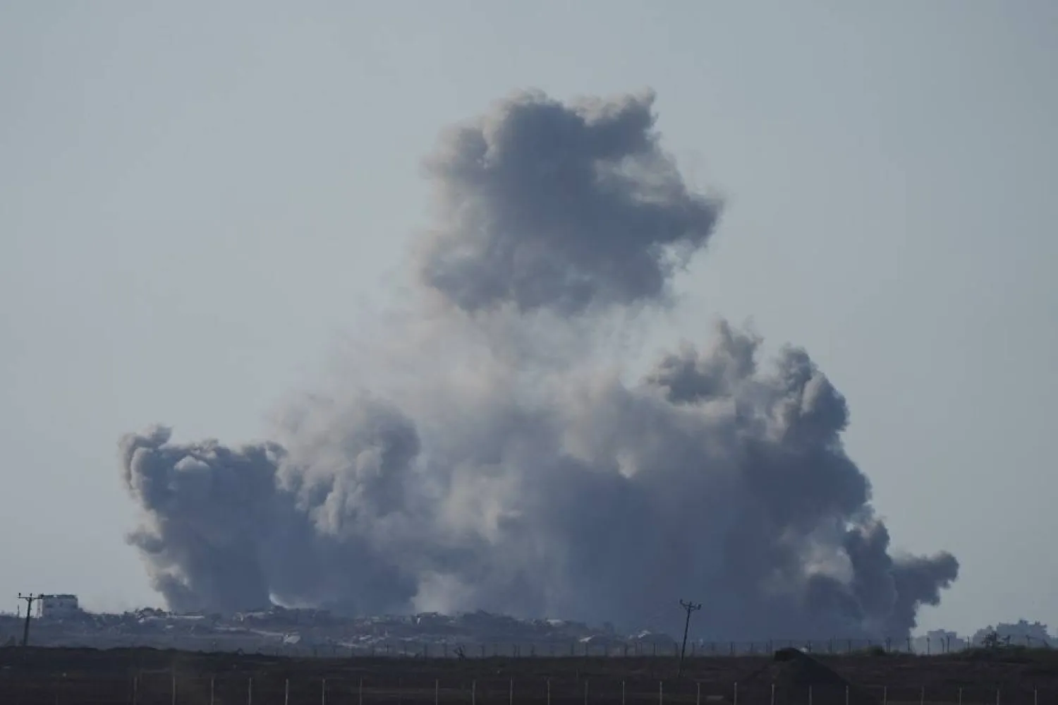 Smoke rises to the sky following an Israeli strike in the Gaza Strip, as seen from southern Israel, Monday, Aug. 18, 2025. (AP)