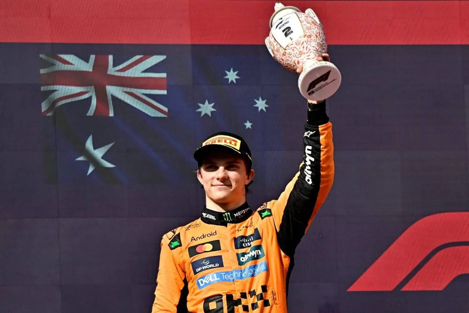 Formula One F1 - Hungarian Grand Prix - Hungaroring, Budapest, Hungary - August 3, 2025 McLaren's Oscar Piastri celebrates on the podium with a trophy after finishing second place in the Hungarian Grand Prix. (Reuters)