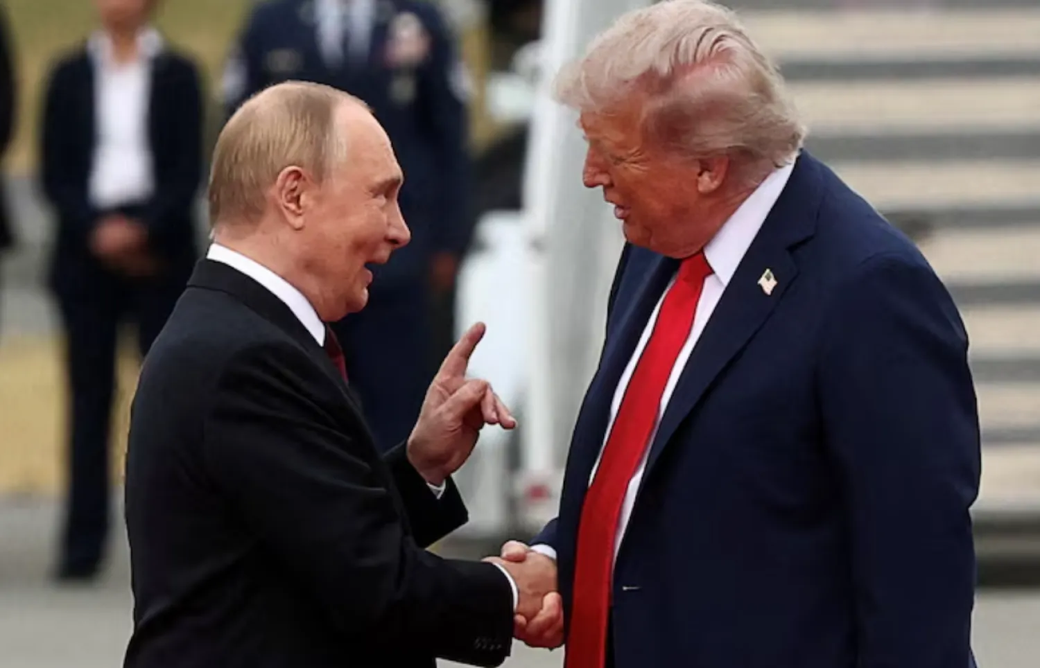 US President Donald Trump shakes hand with Russian President Vladimir Putin, as they meet to negotiate for an end to the war in Ukraine, at Joint Base Elmendorf-Richardson in Anchorage, Alaska, US, August 15, 2025. REUTERS/Kevin Lamarque/File Photo