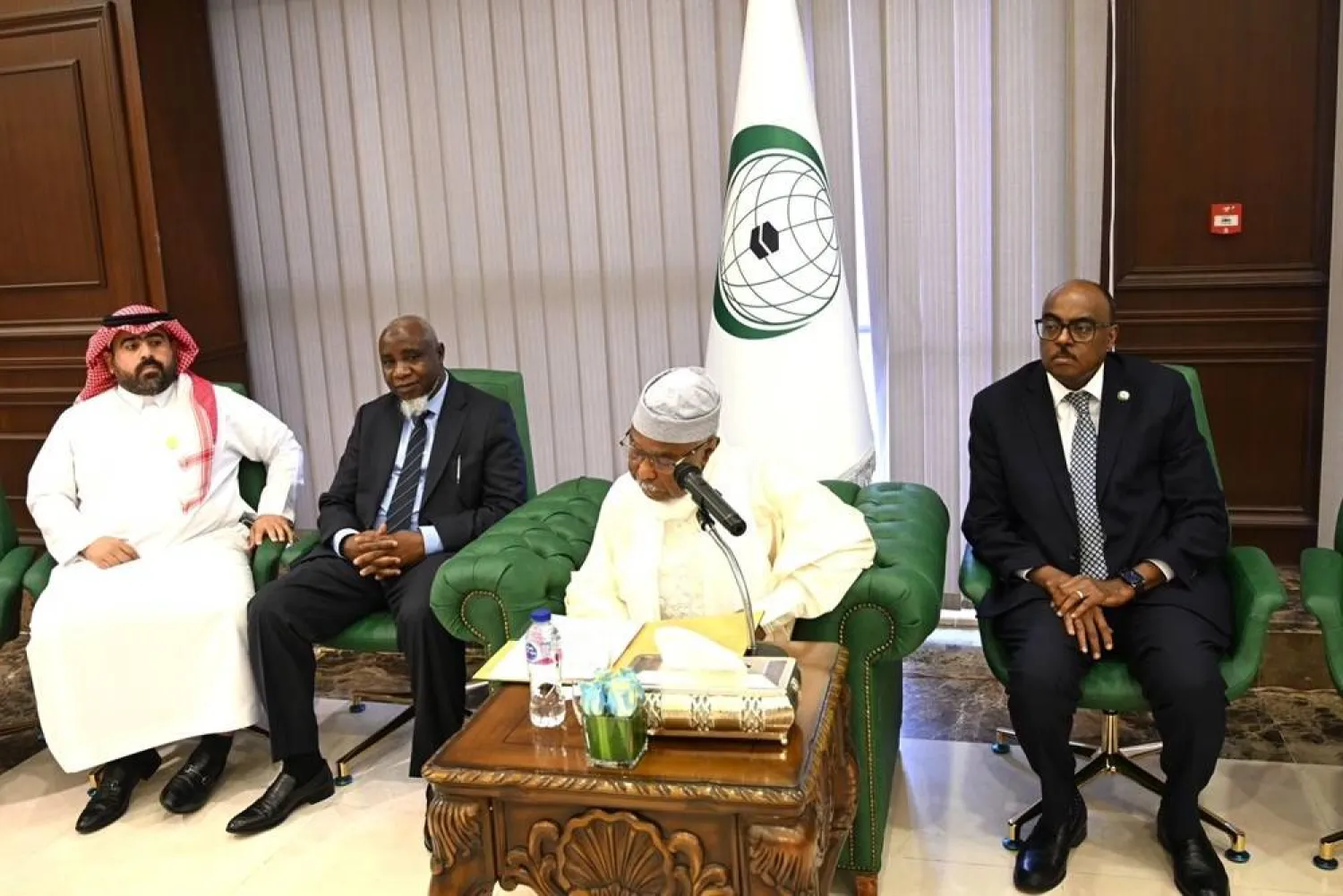 OIC Secretary-General Hissein Ibrahim Taha and other officials mark World Humanitarian Day in Jeddah. (OIC)