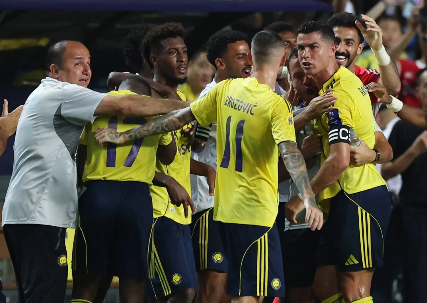 Soccer Football - Saudi Super Cup - Semi Final - Al Nassr v Al Ittihad - Hong Kong Stadium, Hong Kong, China - August 19, 2025 Al Nassr's Cristiano Ronaldo celebrates with teammates after Joao Felix scores their second goal REUTERS/Tyrone Siu
