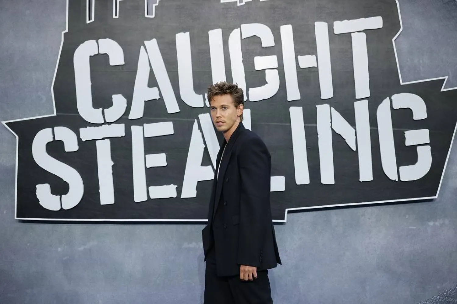 US actor and cast member Austin Butler poses on the blue carpet at the gala screening of "Caught Stealing" at the Odeon Luxe in Leicester Square, London, Britain, 19 August 2025. (EPA)