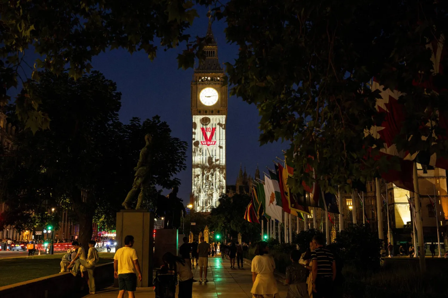 The Elizabeth Tower at the Houses of Parliament is illuminated on VJ Day, as a tribute to those who served in WW2, in London, Britain, August 15, 2025. House of Commons/Handout via REUTERS 