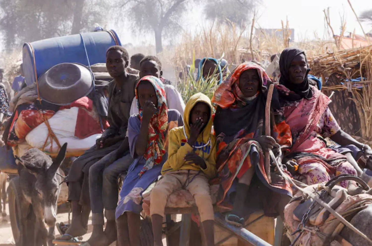 Displaced people ride a an animal-drawn cart, following Rapid Support Forces (RSF) attacks on Zamzam displacement camp, in the town of Tawila, North Darfur, Sudan April 15, 2025. REUTERS/Stringer/File Photo 