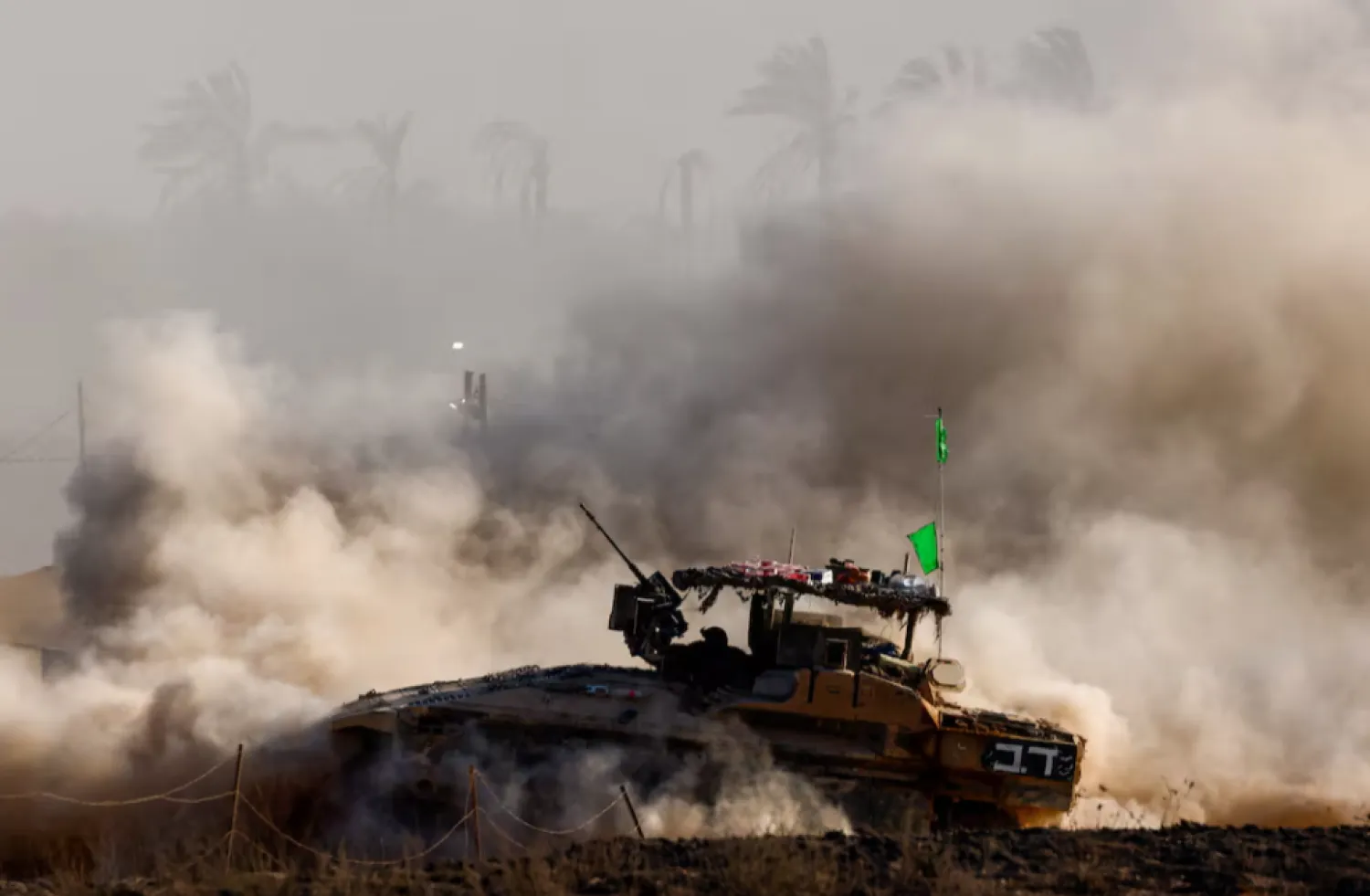 An Israeli armoured personnel carrier (APC) manoeuvres on the Israeli side of the border with Gaza, Israel August 19, 2025. REUTERS/Amir Cohen/File Photo 