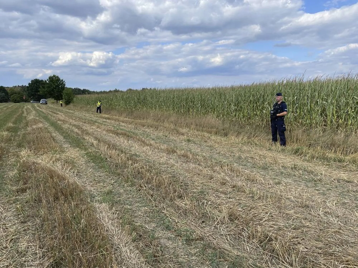  Police secure the area of a cornfield where an unidentified flying object has crashed and exploded in the country's east in Osiny, Poland, Wednesday, Aug. 20, 2025. (AP)