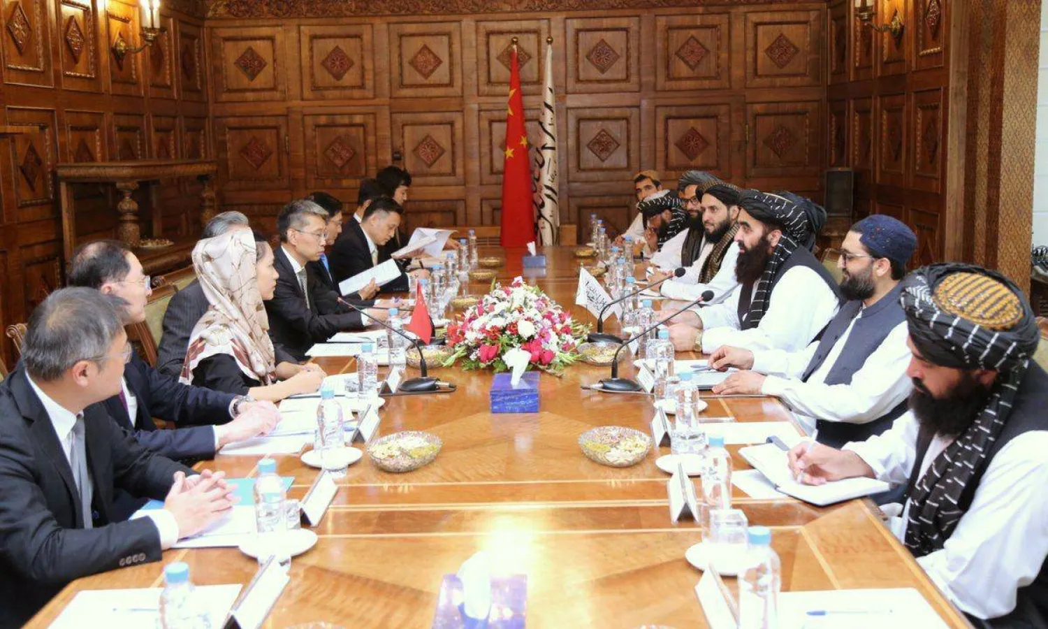A handout photo made available by the Afghan Foreign Ministry shows Acting Foreign Minister of Afghanistan Mawlawi Amir Khan Muttaqi (3-R) meeting with Chinese Foreign Minister Wang Yi (not pictured) in Kabul, Afghanistan, 20 August 2025. (EPA/ Afghan Foreign Ministry Handout) 