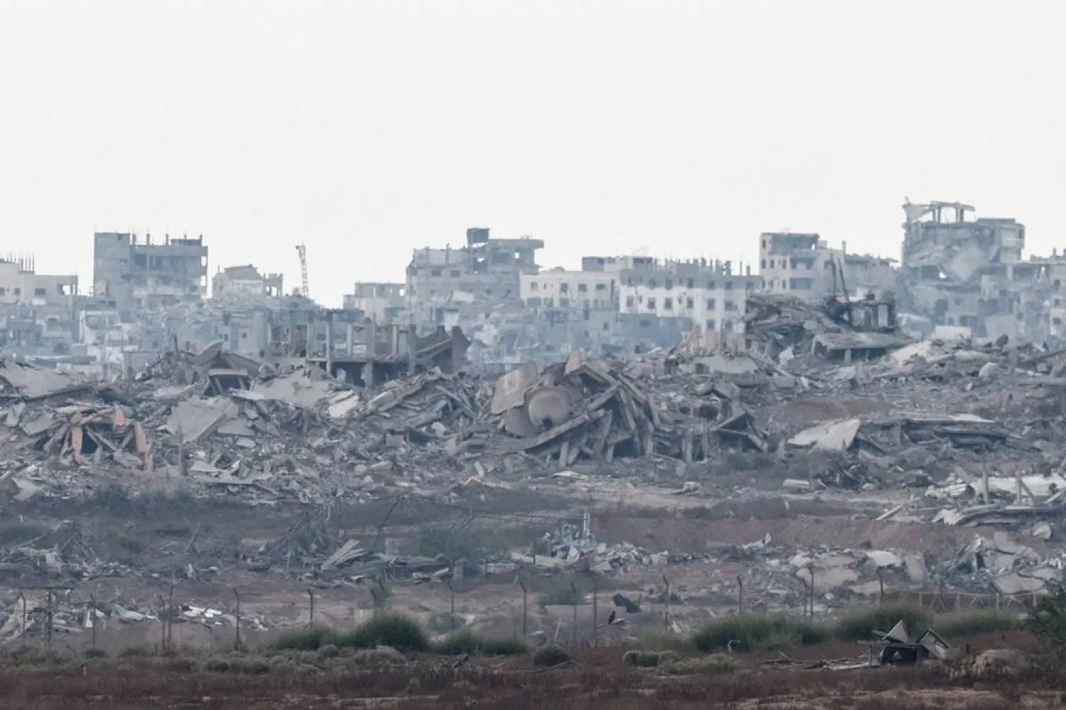 A view of destroyed buildings in Gaza, as seen from the Israeli side of the border between Gaza and Israel, August 19, 2025. (Reuters)
