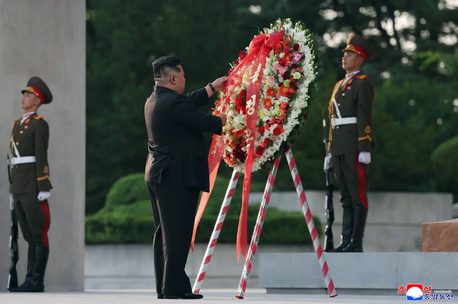 This picture taken on August 15, 2025 and released from North Korea's official Korean Central News Agency (KCNA) on August 16, 2025 shows North Korean leader Kim Jong Un visiting the Liberation Tower to mark the the 80th anniversary of Korea's liberation in Pyongyang. (Photo by KCNA VIA KNS / AFP) 