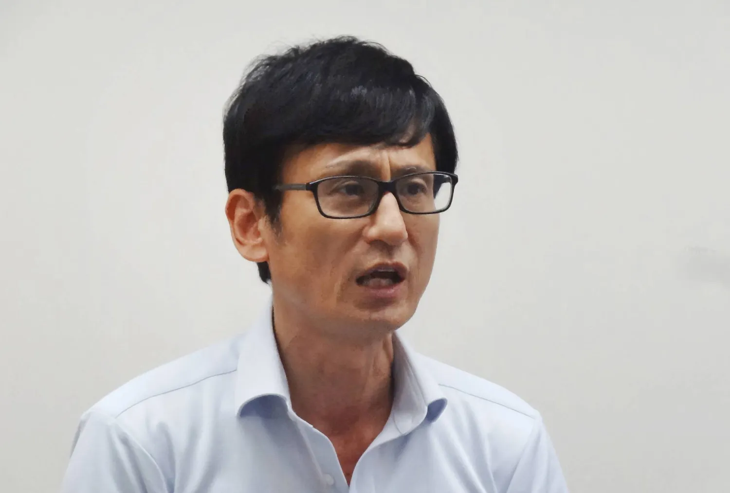 Japan Boxing Commission (JBC) secretary general Tsuyoshi Yasukochi speaks during a press conference in Tokyo on August 12, 2025. (Photo by JIJI Press / AFP)
