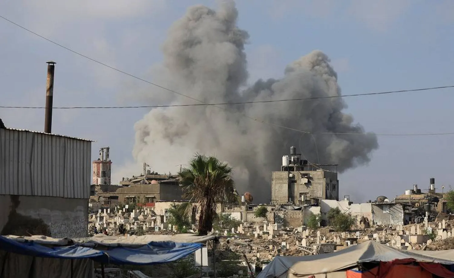 Smoke rises following an Israeli strike, in Gaza City, August 22, 2025. (Reuters)