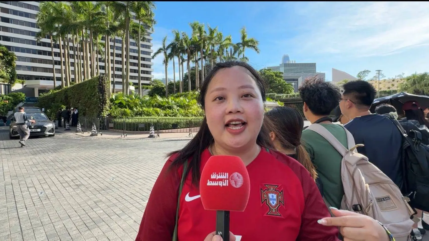 فتاة من هونغ كونغ تعبر عن سعادتها بعد رؤية رونالدو (الشرق الأوسط)