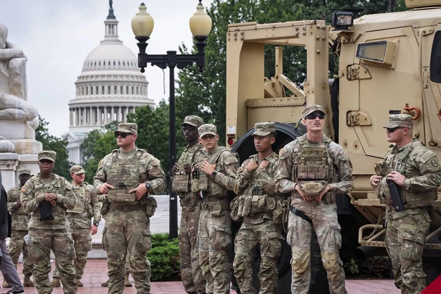  Protesters, police, and National Guard troops congregate at the entrance to Union Station in Washington, where Defense Secretary Pete Hegseth and Vice President JD Vance visited Wednesday, Aug. 20, 2025. (AP) 