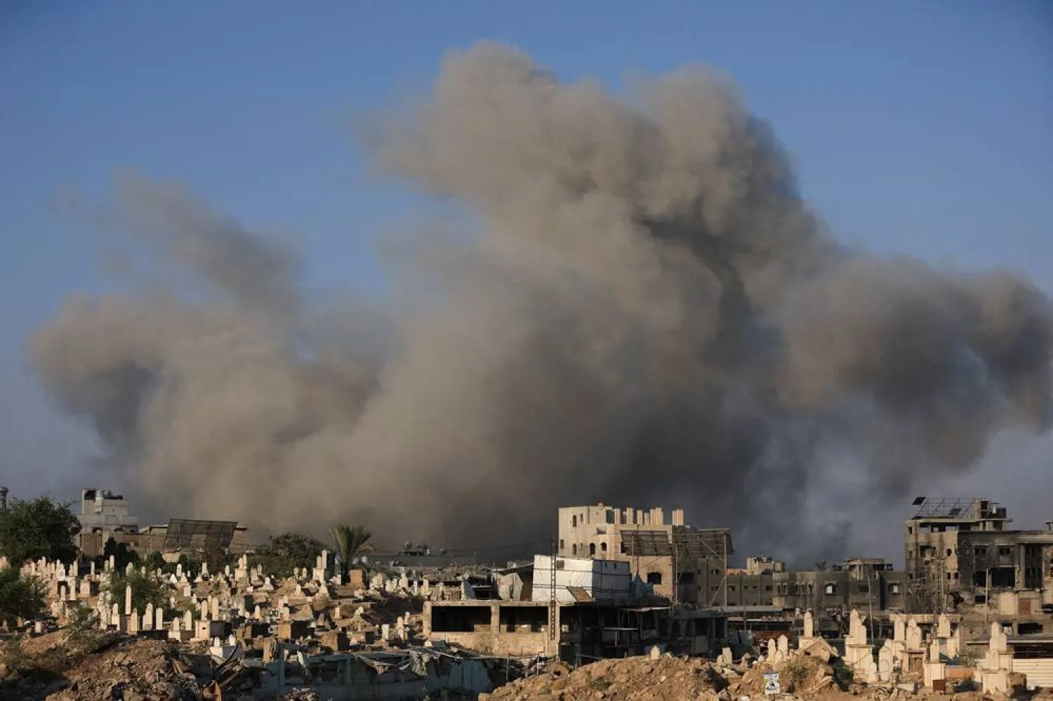 Smoke rises following an Israeli strike, in Gaza City, August 23, 2025. (Reuters)