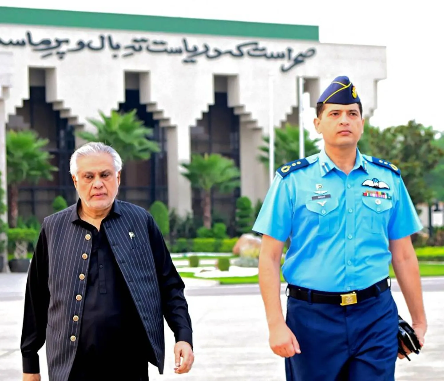 In this handout photograph taken and released by Pakistan's Ministry of Foreign Affairs on August 23, 2025, Pakistan's Foreign Minister Ishaq Dar (L) departs for Bangladesh, from Islamabad. (Handout / Pakistan's Ministry of Foreign Affairs / AFP) 